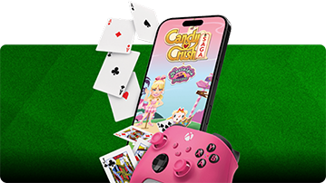 Smartphone displaying the Candy Crush Saga home screen with animated characters, surrounded by floating playing cards and a pink XBOX controller in the foreground, set against a green diagonal-striped background.
